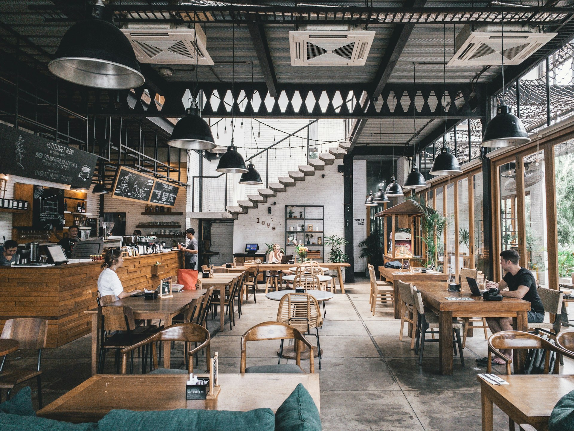 A warm bar and grill interior set for a night of food, drinks, and conversation